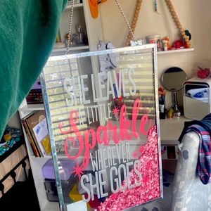 Hanging picture, “She Leaves A Sparkle Wherever She Goes” sequences inside